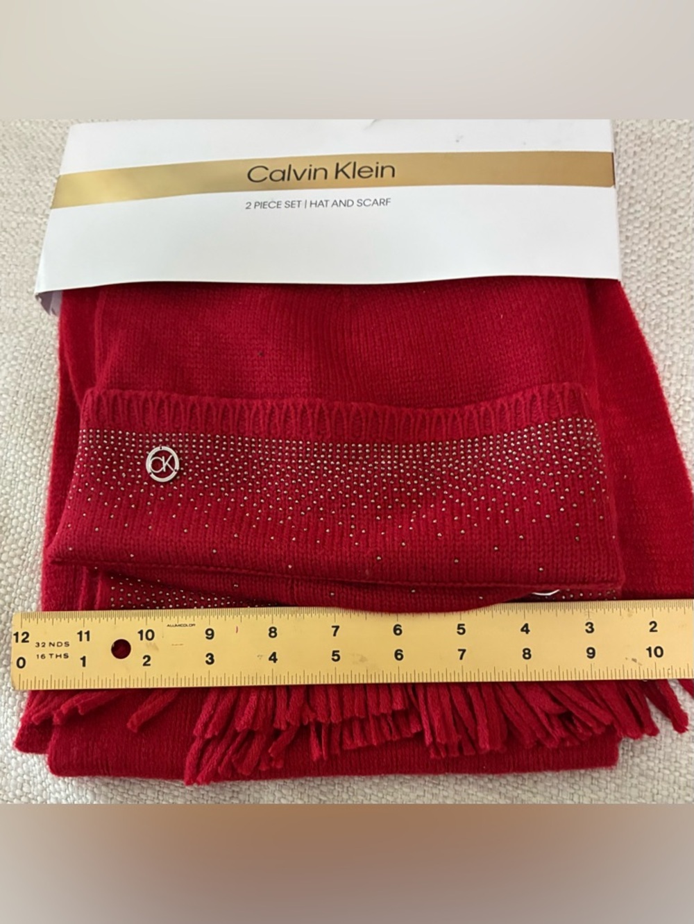 Calvin KleinNWT Scarf & Hat Set
Red Rouge with Silver CK
Logo & Sparkle - Picture 9 of 9